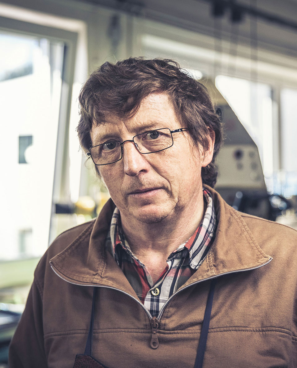 Portrait photo of Rolf in the Hanwag factory for double-stitched footwear Best walking boots