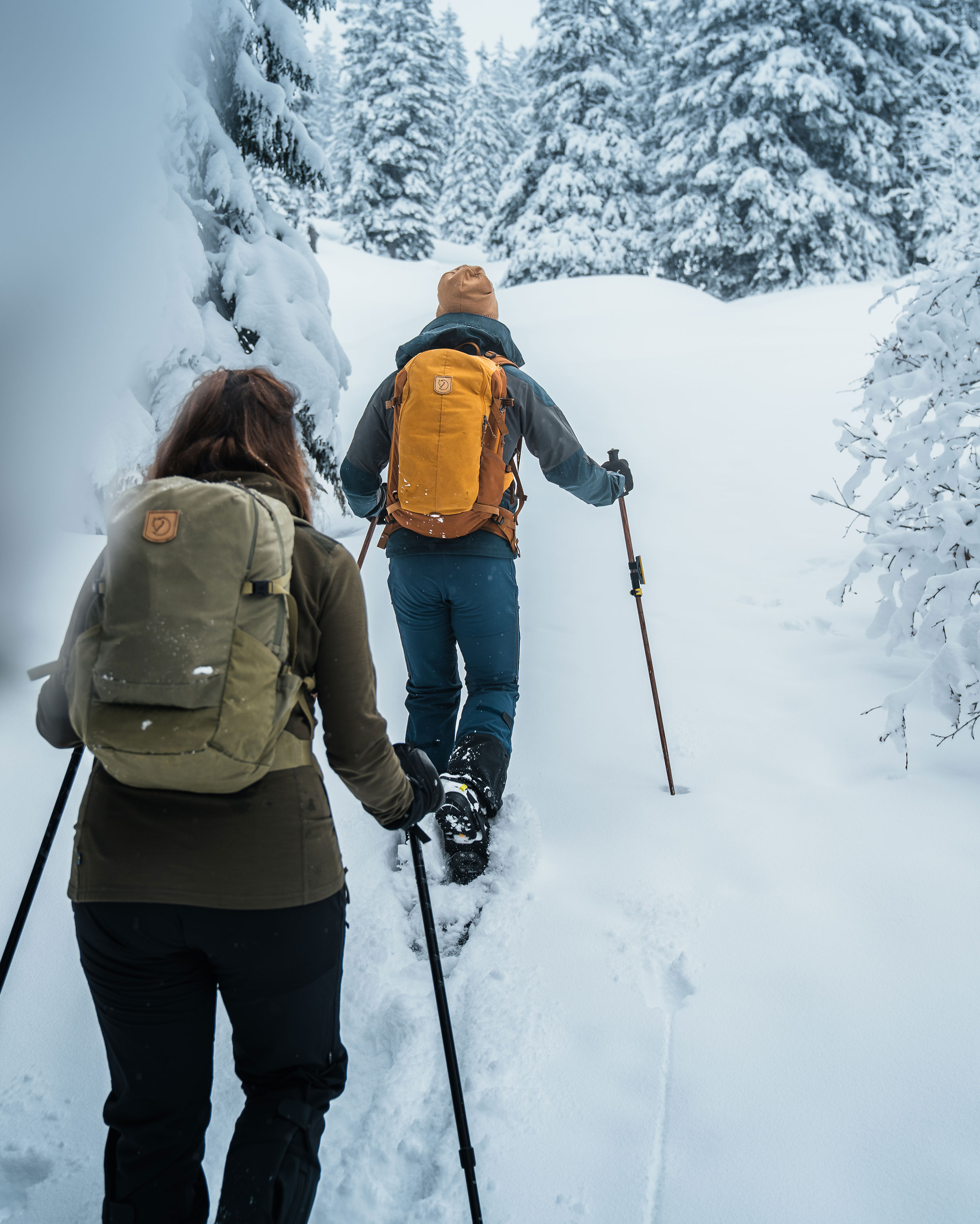 Two people on a snowshoe hike in the Bregenz Forest